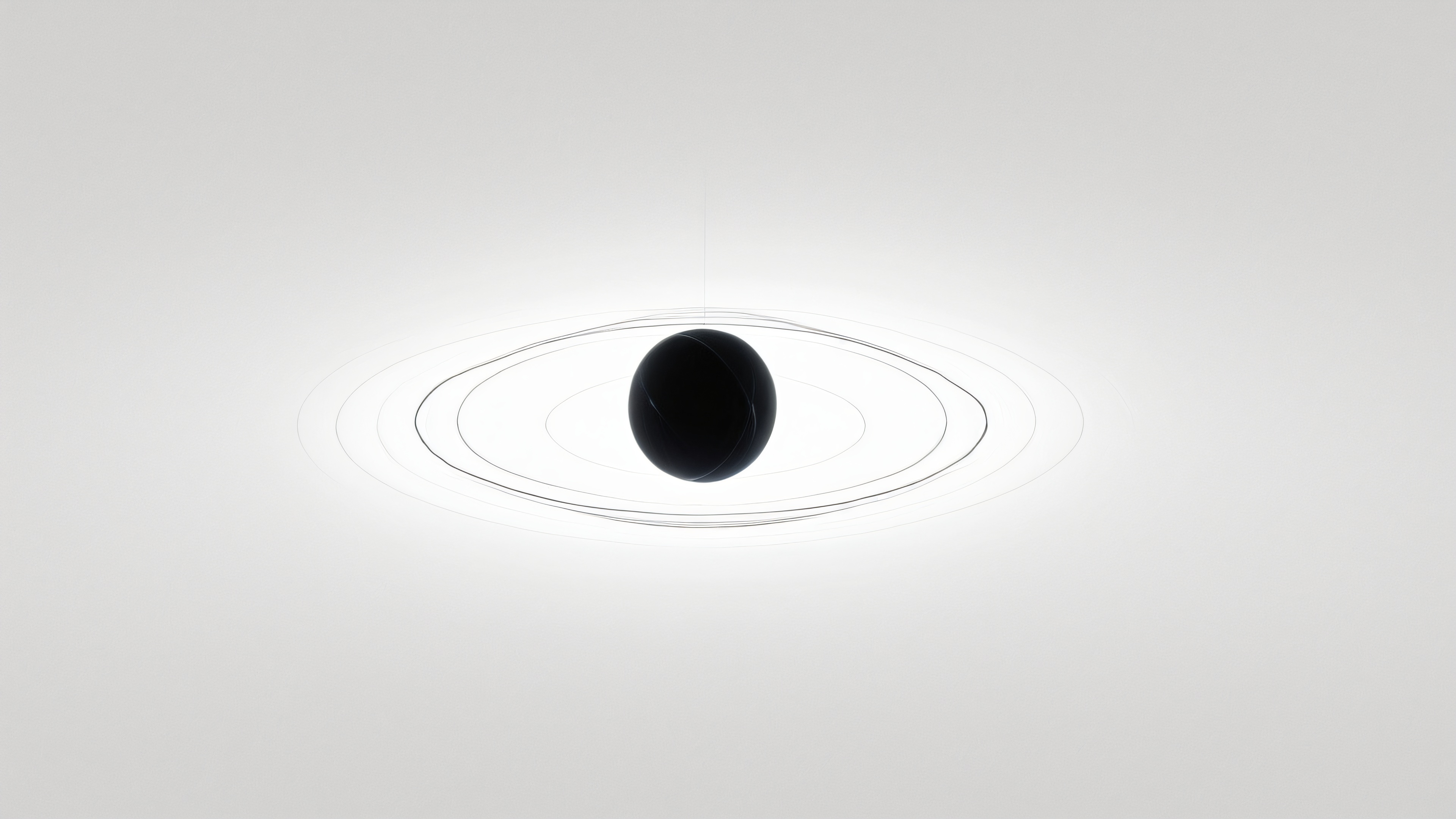 A stunning desktop wallpaper featuring a perfect black sphere, warping space-time, with gravitational lensing distortion on a pure white background, amidst astrophysical study.