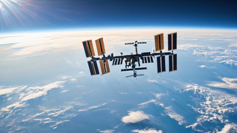 iss wallpaper 4k serene blue skies scaled