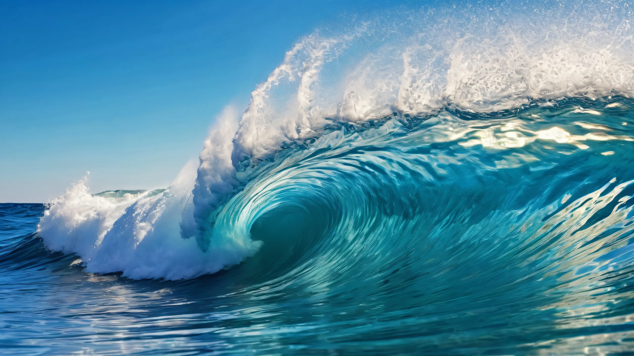 Desktop/PC wallpaper featuring stunning ocean waves and radiating colors, perfect for a serene computing experience.